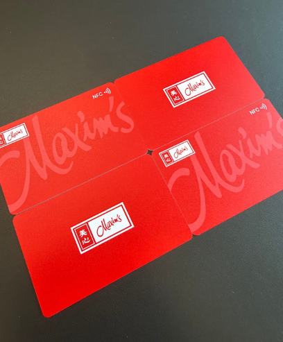 Maxim’s Group — custom red cards